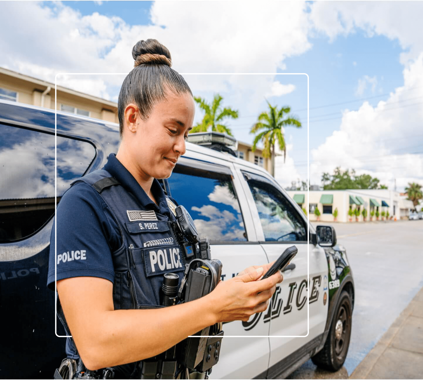 Officer Looking at Device