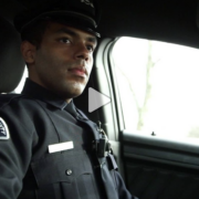 a police officer in his vehicle